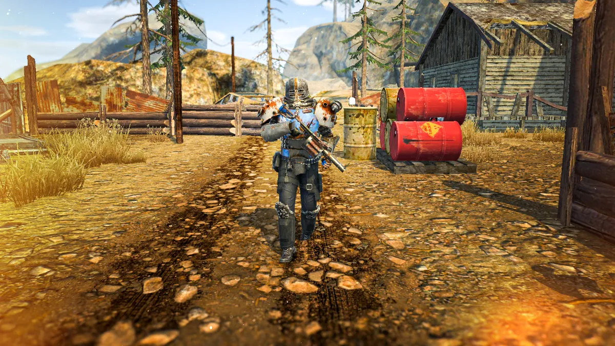 A survivor in combat gear walks past red barrels at a frontier camp.